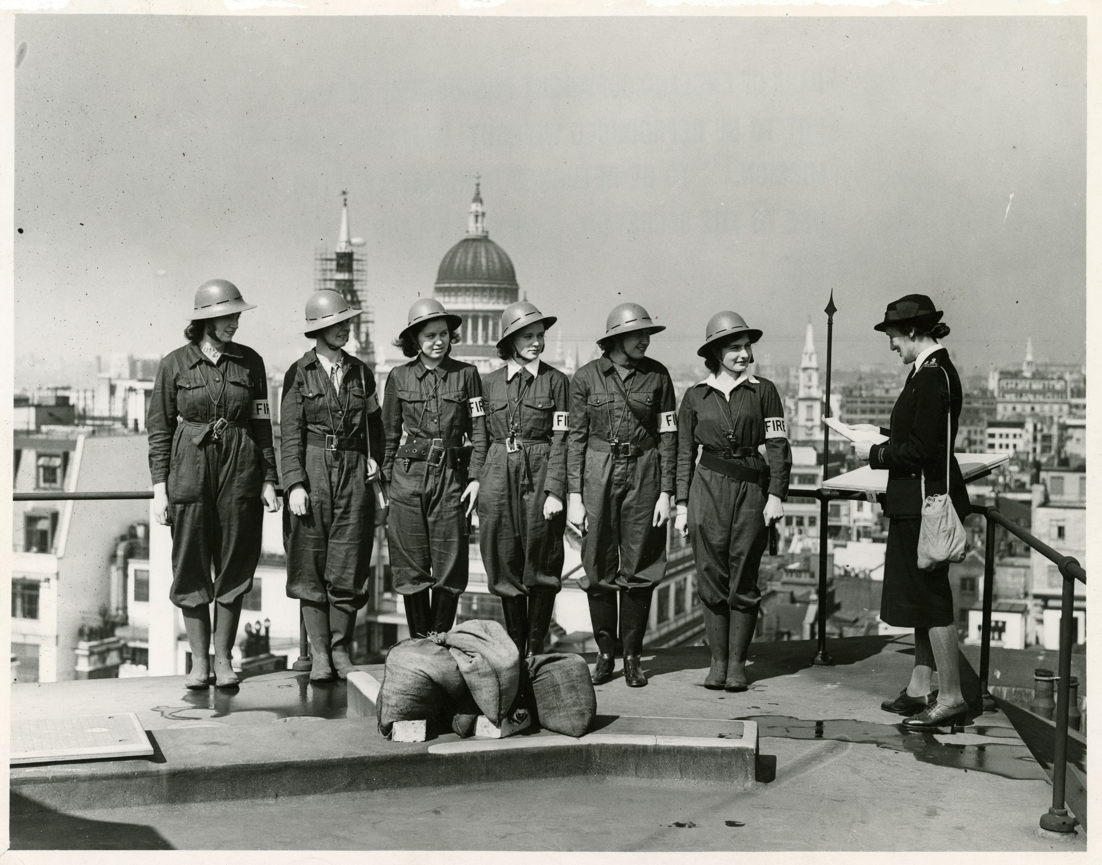 Women Fire Guards practising on the roof of the Bank, Threadneedle Street 1942 (Archive reference: 15A13/1/4/22)